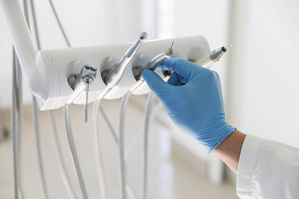 Professional Tooth Extraction technician working in Gold River, CA